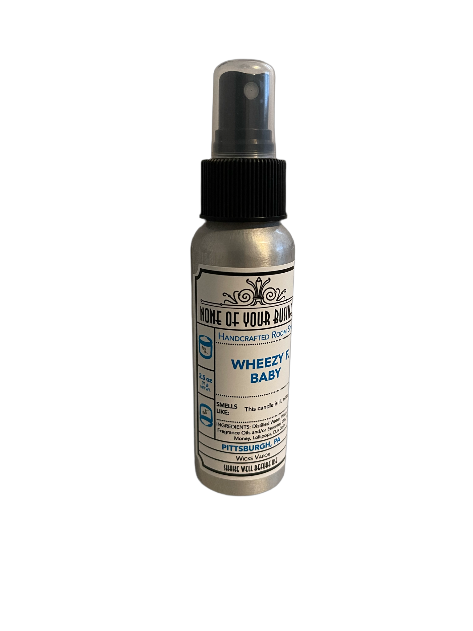 Temp Pic: photo of room spray aluminum bottle with black plastic spray cap, Wheezy F. Baby label. 